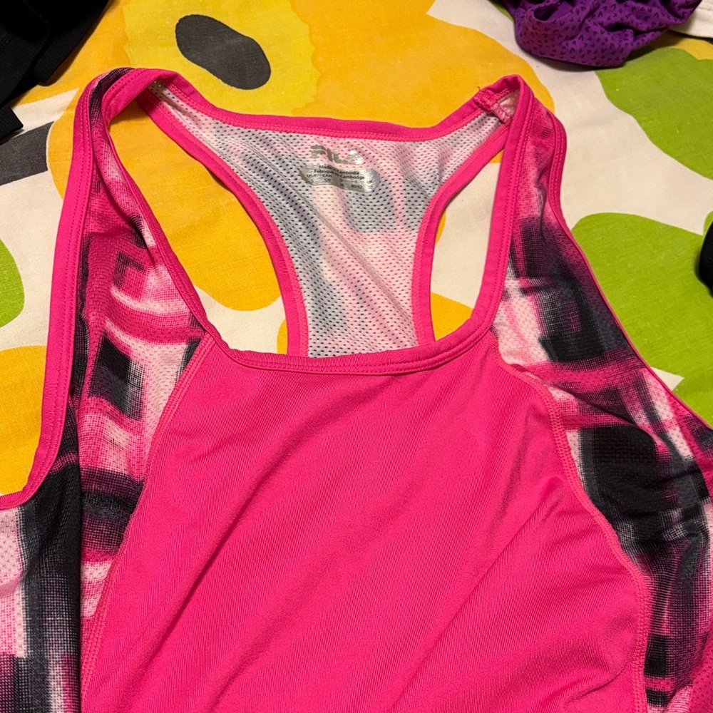 Vibrant Pink Women's Fila athletic top, long, loose fit.